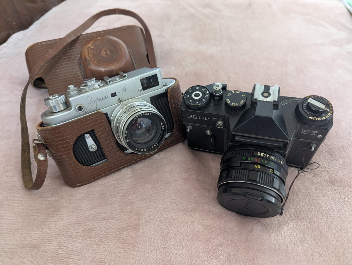 Vintage Soviet cameras Zenit and Zorki 4 from the 1980s-90s used for childhood film photography